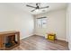 Neutral bedroom with wood-look flooring and a ceiling fan at 4759 E Woburn Ln, Cave Creek, AZ 85331