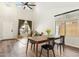 Inviting dining room with ample natural light, neutral walls, and wood flooring, offering a warm atmosphere at 4759 E Woburn Ln, Cave Creek, AZ 85331