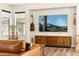 Cozy living room featuring modern furnishings, a sleek entertainment center, and stylish decor at 4759 E Woburn Ln, Cave Creek, AZ 85331