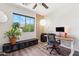 Modern home office featuring a sleek desk, comfortable chair, and bright window view at 4759 E Woburn Ln, Cave Creek, AZ 85331