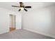 Bedroom features a ceiling fan and carpet at 4920 E Osborn Rd, Phoenix, AZ 85018