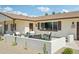 Charming front porch with a seating area, a low wall, and a desert-landscaped yard at 4920 E Osborn Rd, Phoenix, AZ 85018