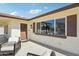 Comfortable front porch with seating, views of neighborhood, and natural light at 4920 E Osborn Rd, Phoenix, AZ 85018