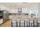 Modern kitchen featuring a granite countertop island, stainless steel appliances, and a stylish backsplash at 4920 E Osborn Rd, Phoenix, AZ 85018