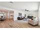 Bright, open living room featuring wood floors, recessed lighting, and neutral decor with modern furnishings at 4920 E Osborn Rd, Phoenix, AZ 85018