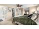 Comfortable bedroom with a king bed, neutral colors, and ample closet space at 5612 S 21St Pl, Phoenix, AZ 85040