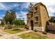 A charming two-story home with lush front yard, walkway and inviting curb appeal at 5612 S 21St Pl, Phoenix, AZ 85040