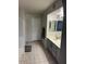 Bathroom with tile floor, single sink vanity, and shower-tub combo at 60 S Willow Creek St, Chandler, AZ 85225