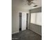 Carpeted bedroom with a closet and window offering natural light at 60 S Willow Creek St, Chandler, AZ 85225