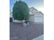 Two-story home featuring desert landscaping and an attached two car garage at 60 S Willow Creek St, Chandler, AZ 85225