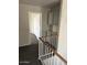 Hallway featuring railing and built in storage at 60 S Willow Creek St, Chandler, AZ 85225