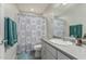 Cozy bathroom includes neutral walls, with shower, toilet, vanity, and modern fixtures at 6305 W Pleasant Oak Ct, Florence, AZ 85132