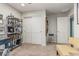 Functional office space features shelving, and closet with sliding doors for ample storage at 6305 W Pleasant Oak Ct, Florence, AZ 85132