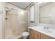 Bathroom with glass shower door, vinyl sink, and toilet at 6391 S Oakmont Dr, Chandler, AZ 85249