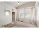 Bedroom with natural light, closet, ceiling fan, and dated finishes at 6391 S Oakmont Dr, Chandler, AZ 85249