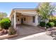 Inviting single-story home with a covered carport area and blooming foliage surrounding the entryway at 6391 S Oakmont Dr, Chandler, AZ 85249