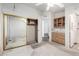 Main bedroom features mirrored closet, ceiling fan, vanity, and bathroom entrance at 6391 S Oakmont Dr, Chandler, AZ 85249