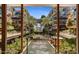 Stunning courtyard view with lush landscaping, a water feature, and balconies on contemporary condo buildings at 7137 E Rancho Vista Dr # 2010, Scottsdale, AZ 85251