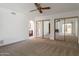 Bedroom features mirrored sliding closet doors and an ensuite bathroom at 7530 E North Ln, Scottsdale, AZ 85258
