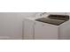 The laundry room includes a Whirlpool washer and dryer with front-load access at 7530 E North Ln, Scottsdale, AZ 85258
