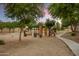 Picturesque community park offers walking paths, a basketball court, playground, and shaded seating at 8500 W Nicolet Ave, Glendale, AZ 85305
