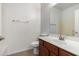 A functional bathroom with a vanity sink, toilet, and well-lit mirror at 8848 W Cordes Rd, Tolleson, AZ 85353