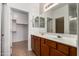 Bathroom featuring dual sinks with plenty of counter space and a mirror above at 8848 W Cordes Rd, Tolleson, AZ 85353