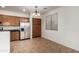 Eat-in kitchen featuring stainless steel appliances, ample cabinet space, and a cozy dining nook for casual meals at 8848 W Cordes Rd, Tolleson, AZ 85353