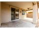 Covered patio with sliding glass door and ceiling fan, perfect for outdoor relaxation at 8848 W Cordes Rd, Tolleson, AZ 85353
