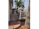 Inviting back deck with neutral furnishings, umbrella, and palm trees providing a relaxing outdoor space at 9302 E Broadway Rd # 157, Mesa, AZ 85208