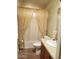 Bathroom with neutral paint, modern sink and vanity, and shower with curtain at 9302 E Broadway Rd # 157, Mesa, AZ 85208