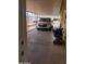 Spacious carport featuring a car, scooter, and ample parking space at 9302 E Broadway Rd # 157, Mesa, AZ 85208