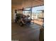 Spacious carport features a golf cart with comfortable seating and sunshade at 9302 E Broadway Rd # 157, Mesa, AZ 85208