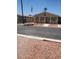 A well-maintained home with a front porch and desert landscaping at 9302 E Broadway Rd # 157, Mesa, AZ 85208