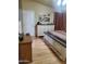 Spacious primary bedroom showcasing neutral paint, wooden floors, and ample storage at 9302 E Broadway Rd # 157, Mesa, AZ 85208