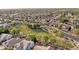 Scenic aerial view of a neighborhood showcasing houses and community green spaces at 1015 E Constitution Dr, Gilbert, AZ 85296