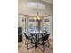 Bright dining area with bay window and seating for four, perfect for Gathering meals at 1015 E Constitution Dr, Gilbert, AZ 85296