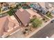 Aerial view of a well maintained home with a desert landscaped front yard in a residential neighborhood at 1015 E Constitution Dr, Gilbert, AZ 85296
