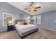 Relaxing main bedroom with vaulted ceilings, a ceiling fan, and stylish decor at 1015 E Constitution Dr, Gilbert, AZ 85296