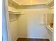 Walk-in closet offers generous storage space, rods and shelves at 10201 N 97Th Ave # B, Peoria, AZ 85345