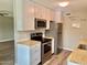 Charming kitchen with stainless steel appliances and butcher block countertops at 10201 N 97Th Ave # B, Peoria, AZ 85345
