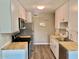 Well-lit kitchen featuring butcher block countertops and modern appliances at 10201 N 97Th Ave # B, Peoria, AZ 85345
