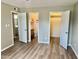 The main bedroom contains vinyl floors, closet and bathroom access at 10201 N 97Th Ave # B, Peoria, AZ 85345