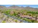 Stunning aerial view of a home in a desert community with mountain backdrop at 10287 E Diamond Rim Dr, Scottsdale, AZ 85255