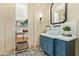 Elegant bathroom with modern vanity, vessel sink, and decorative accents on tile floor at 10287 E Diamond Rim Dr, Scottsdale, AZ 85255