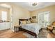 Cozy bedroom features wood floors, a stylish bed, and a small closet leading to a bathroom, creating a comfortable retreat at 10287 E Diamond Rim Dr, Scottsdale, AZ 85255