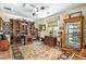 Large study featuring custom millwork, ceiling fan, and decorative rug on hardwood floor at 10287 E Diamond Rim Dr, Scottsdale, AZ 85255
