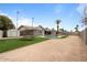 Backyard features a pristine pool, picnic table and storage shed at 1036 S 75Th St, Mesa, AZ 85208