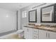 Bathroom featuring dual sinks, granite countertops, shower, and tile flooring at 1036 S 75Th St, Mesa, AZ 85208