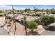 Front exterior of home showcasing well-maintained landscaping and mature trees at 1036 S 75Th St, Mesa, AZ 85208